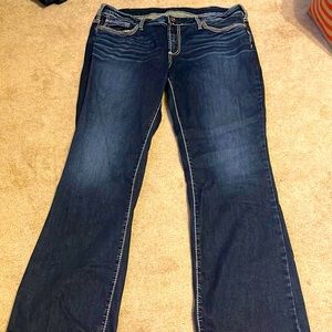 Like new condition dark blue silver jeans